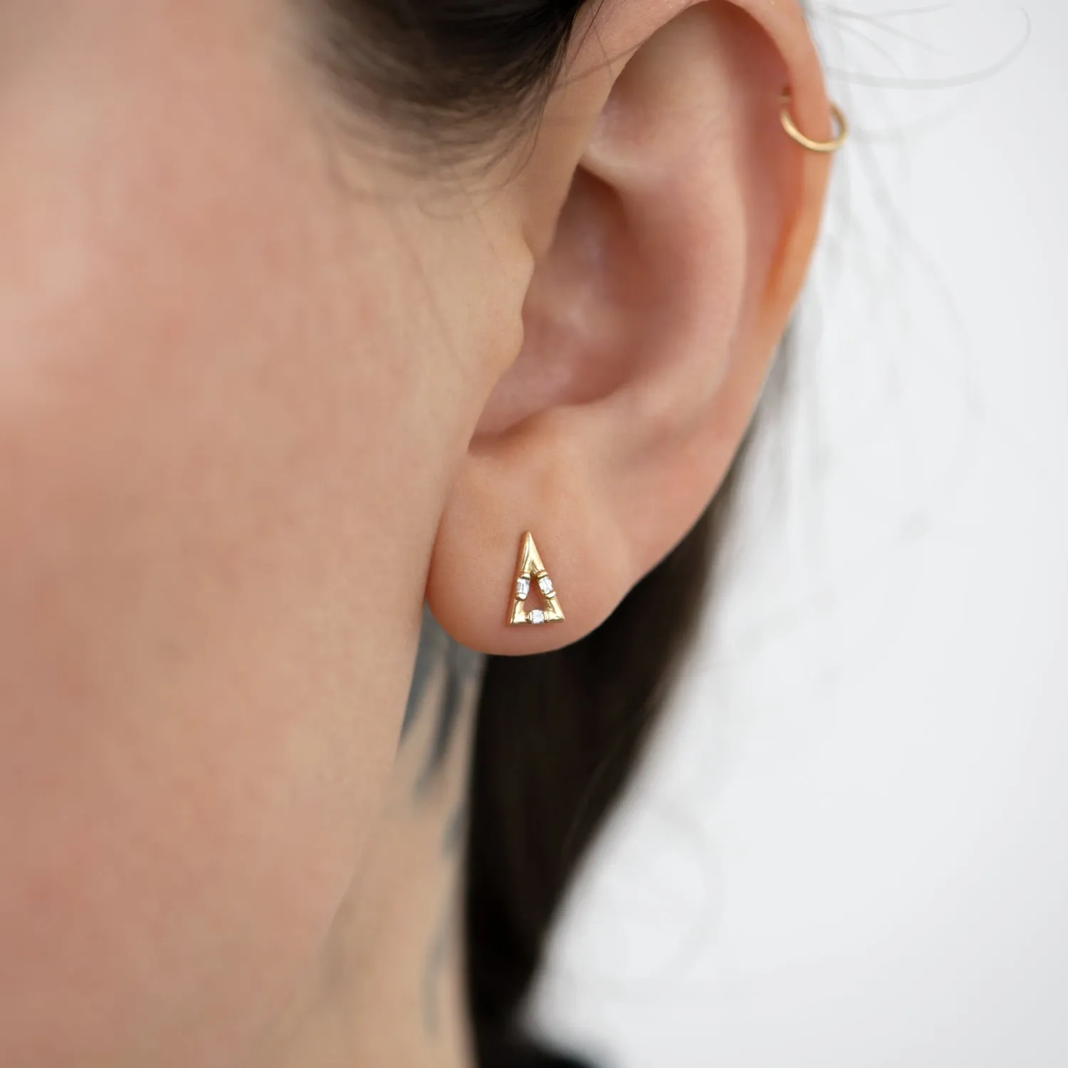 Golden Pyramid Studs with Baguette Cut Diamonds