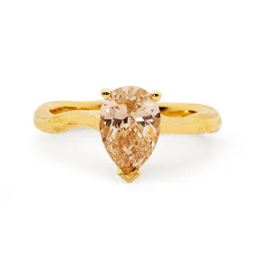 Pear cut champagne diamond solitaire ring